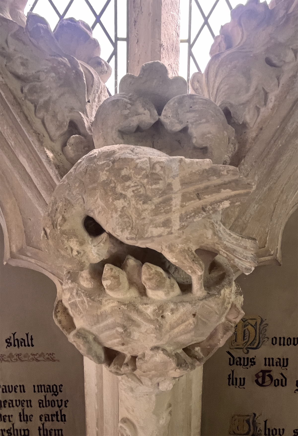 Carved Pelican in Her Piety detail on the St Peter’s Church reredos