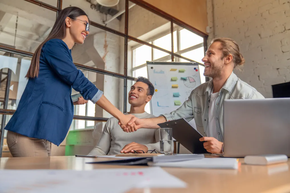 partners shaking hands after the meeting