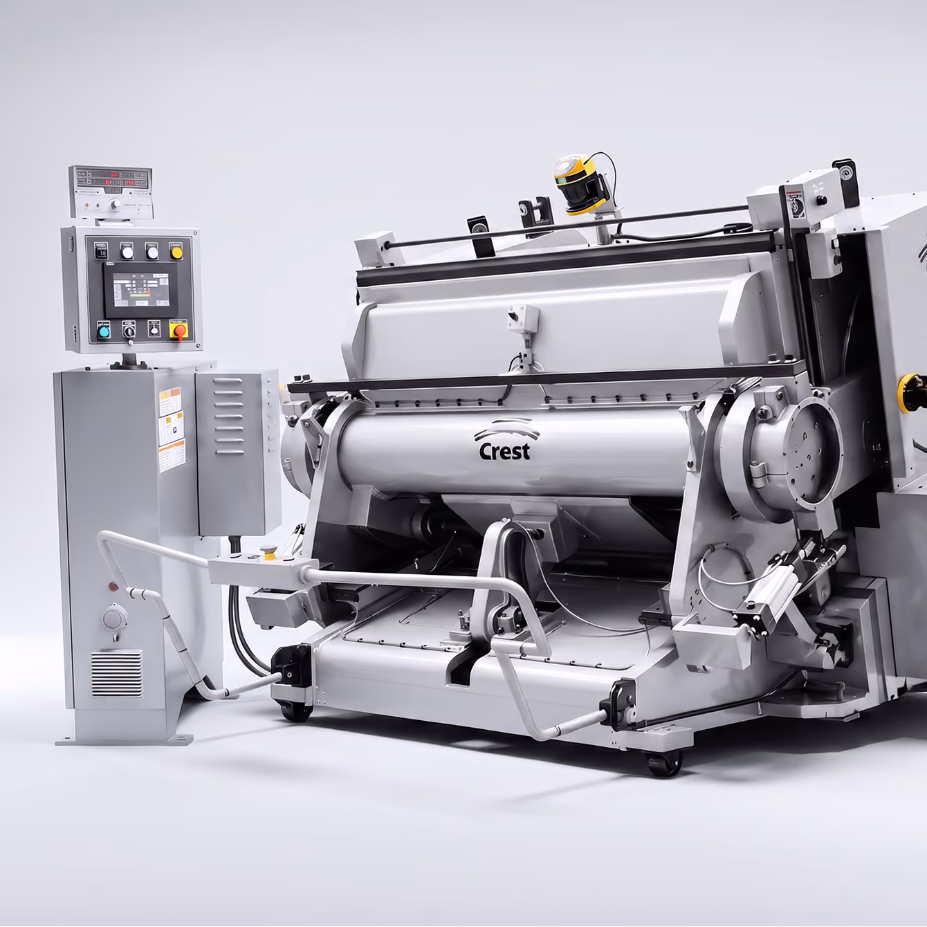 Industrial fabric cutting machine labeled Crest with control panel on the left and safety sensors mounted on top, shown in a clean, white workspace.