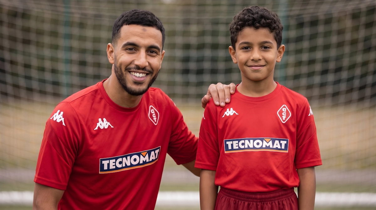 Joueurs d'un club de football amateur en maillot rouge