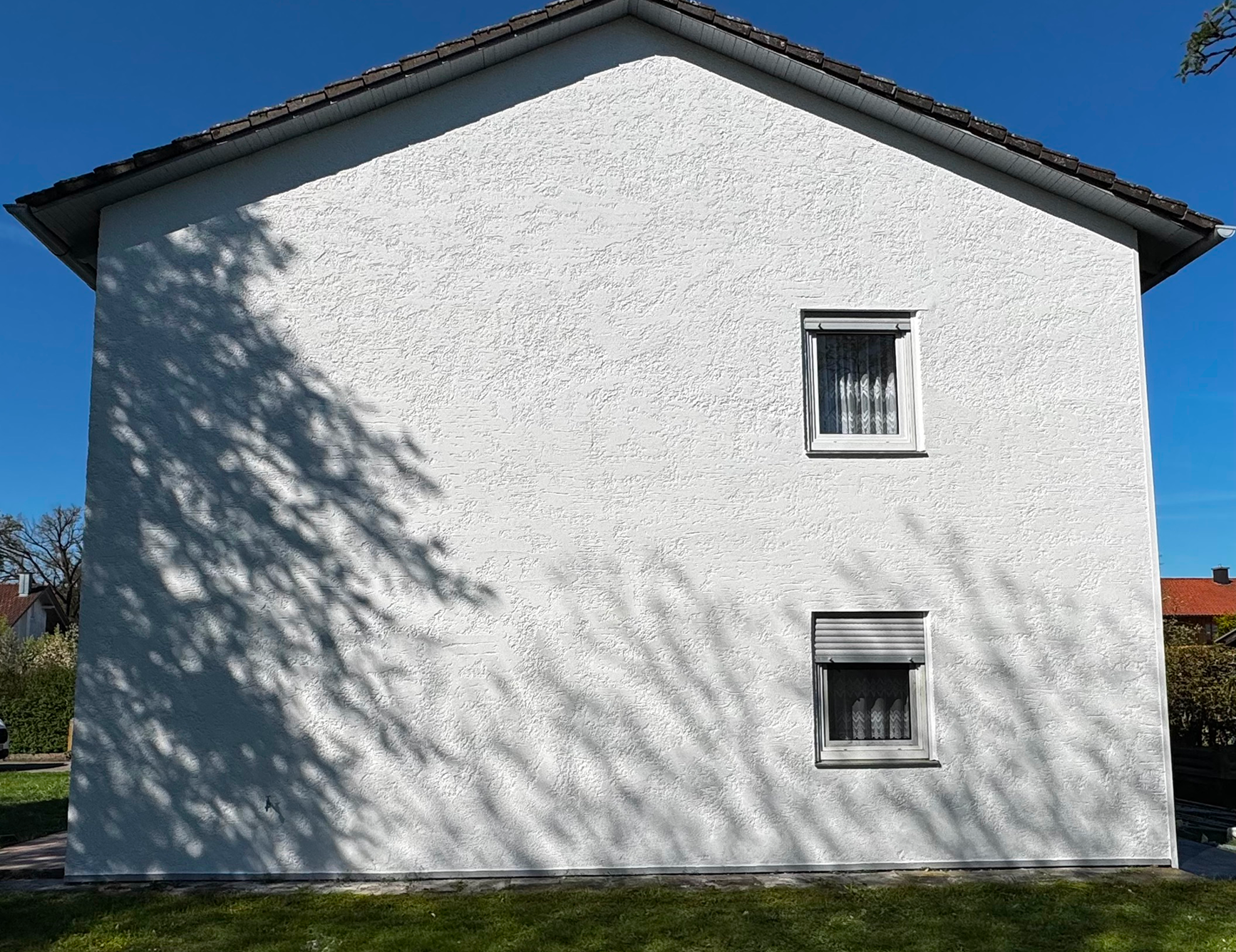 Fassade nach der Renovierung durch Malermeister Schwemmhuber