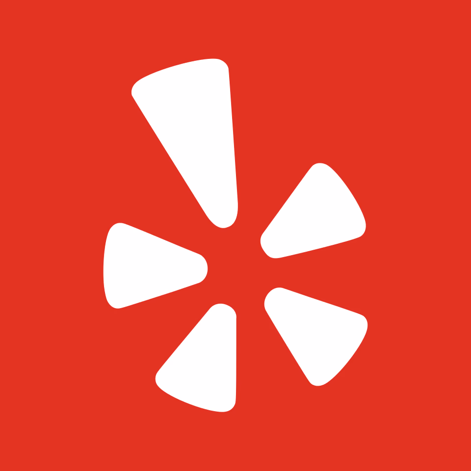 White starburst shape with five rounded triangles on a red background.