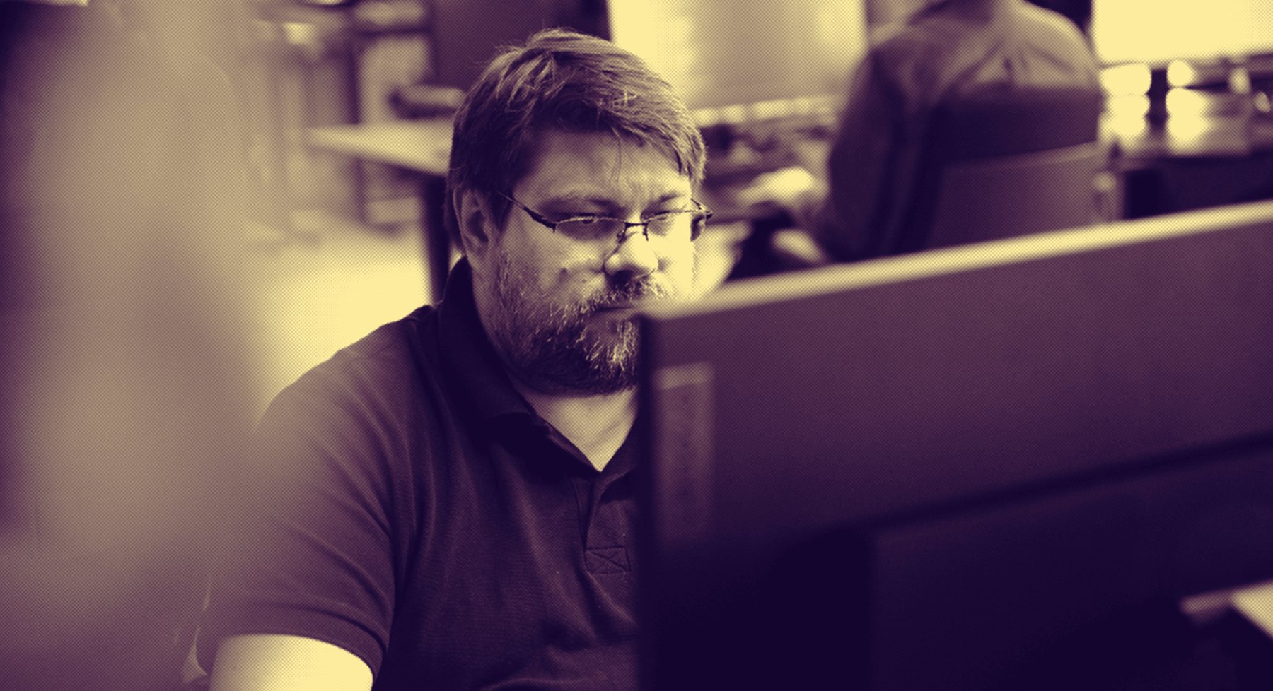 Engineer reviewing data on a monitor