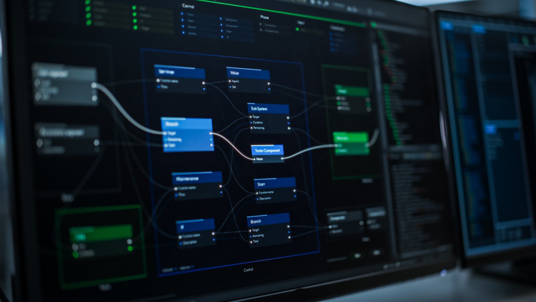 Three engineers reviewing dashboards together