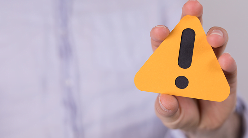 Warning sign representing gift card fraud
