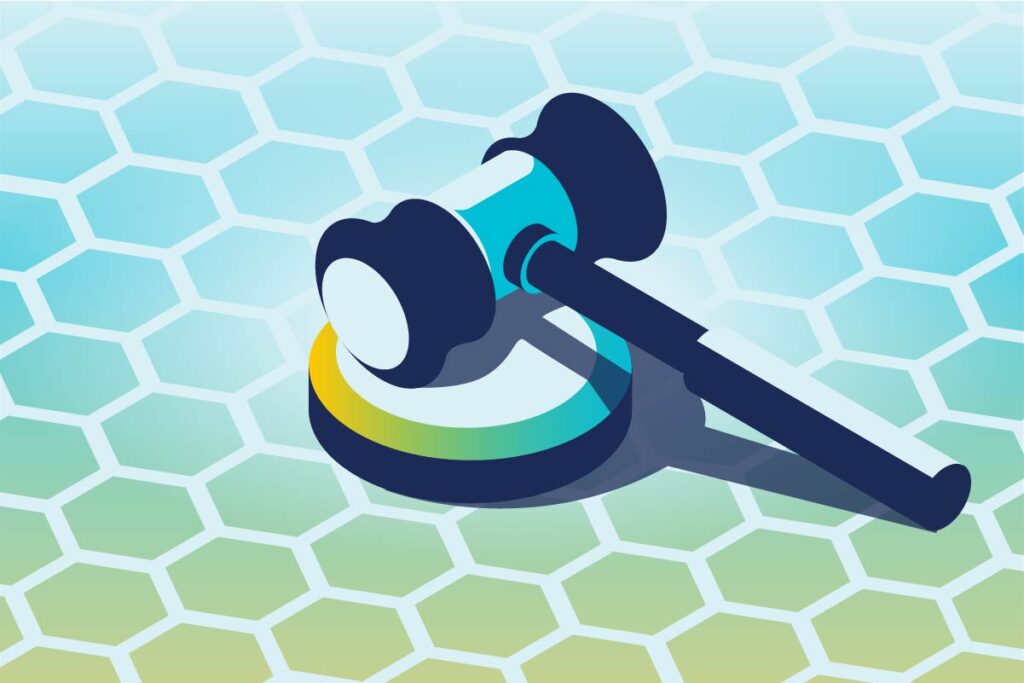 A gavel on a honeycomb pattern representing regulations and standards affecting API Security