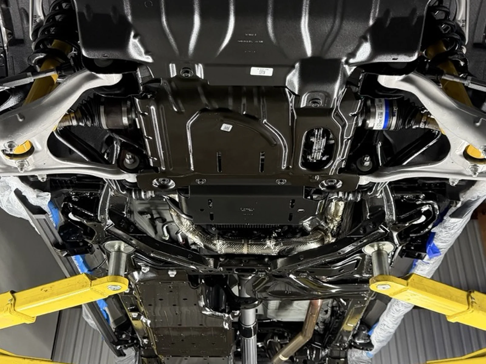 Industrial ceramic coating applied to a vehicle underside