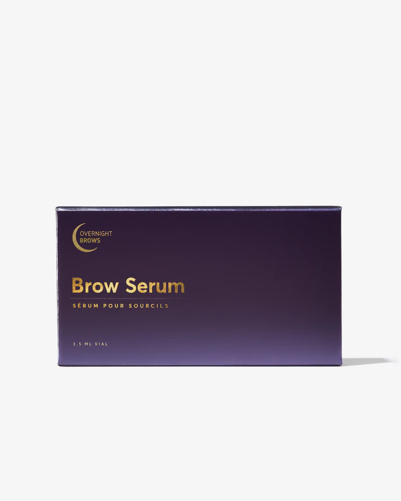 Purple box of Overnight Brows Brow Serum with gold lettering, 3.5 ml vial.