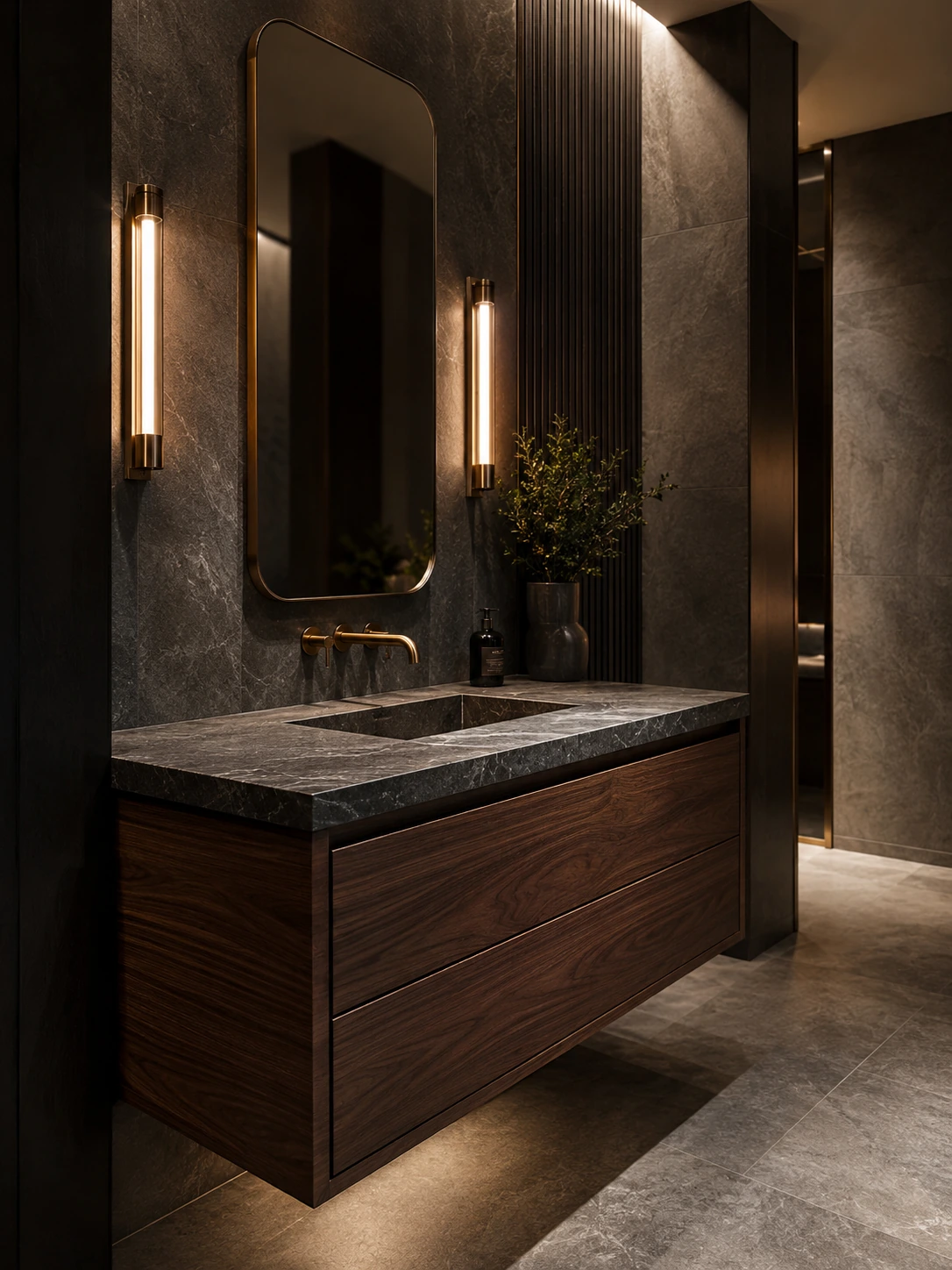 Dark stone vanity sink on a walnut floating cabinet