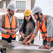 Construction team reviewing plans