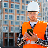 Construction worker using phone