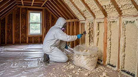 Closed-cell spray foam removal performed by a specialist using mechanical extraction equipment