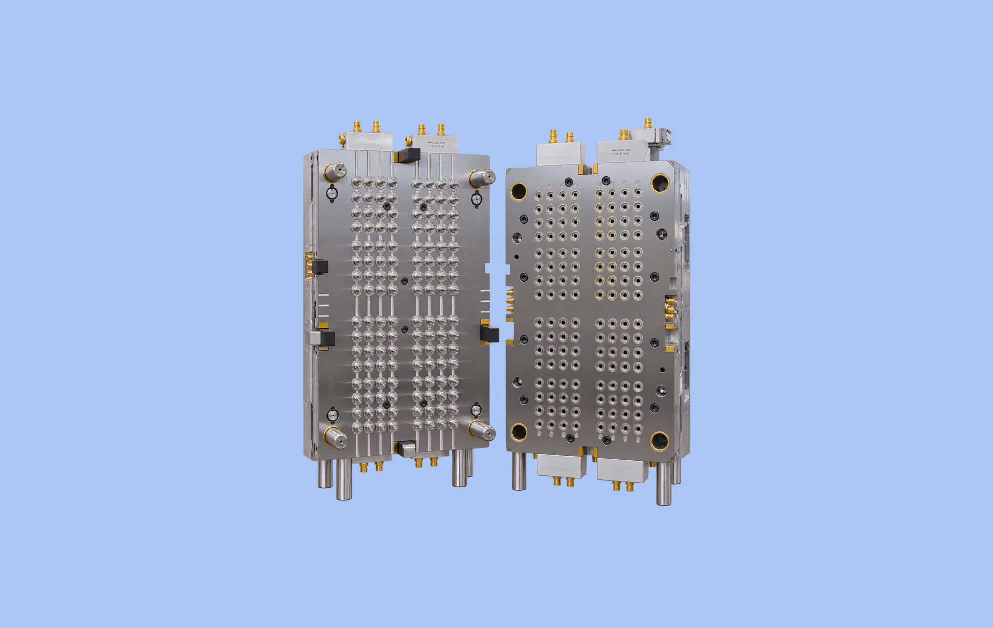 Cavity and core halves of a production mold, side by side