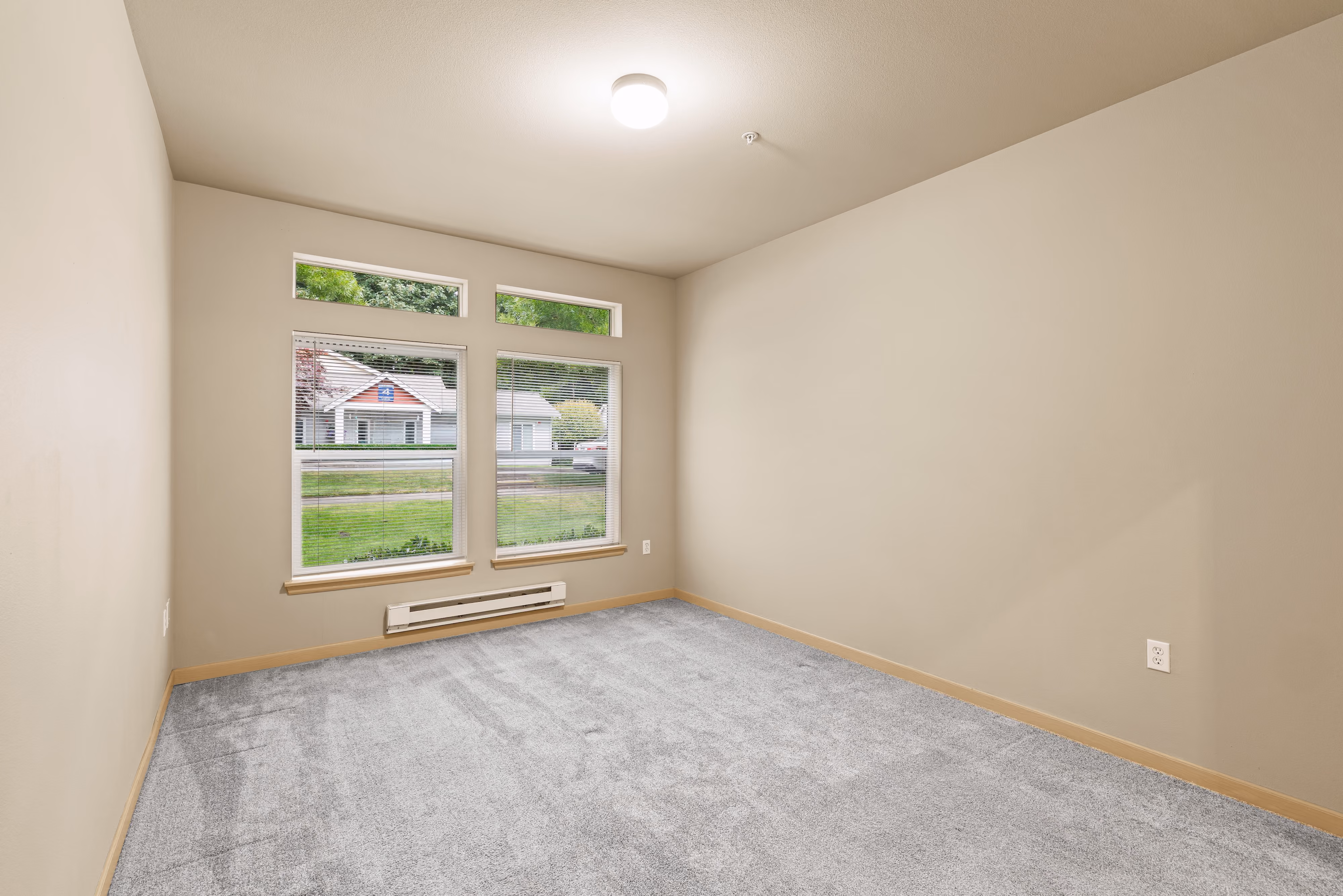 Dining area with fireplace looking into kitchen