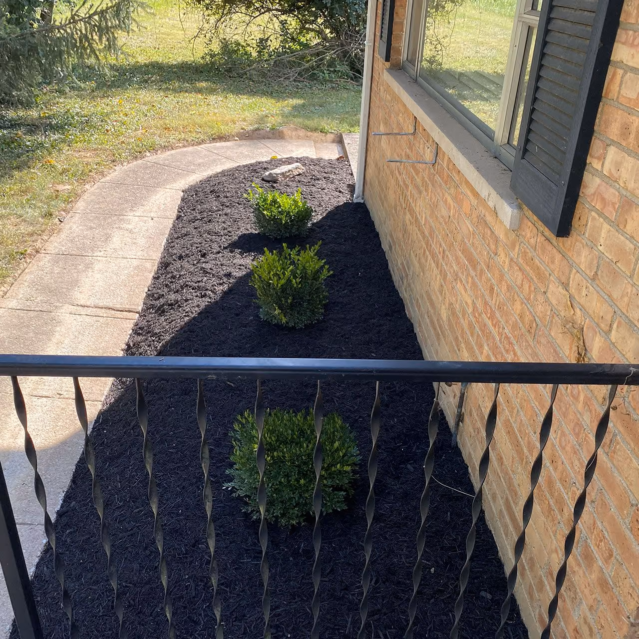 Landscape bed mulching by PerfaCut Lawn and Landscape in Mason, Ohio