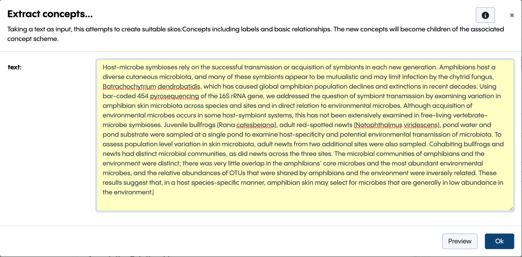 Extract concepts dialog in TopBraid EDG. It explains that the tool takes text as input and creates SKOS concepts with labels and basic relationships, with a scientific abstract about amphibian host-microbe symbioses pasted into the text field.