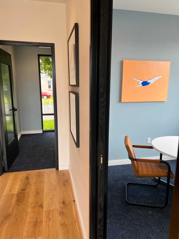 More meeting rooms, with colorful artwork on the walls