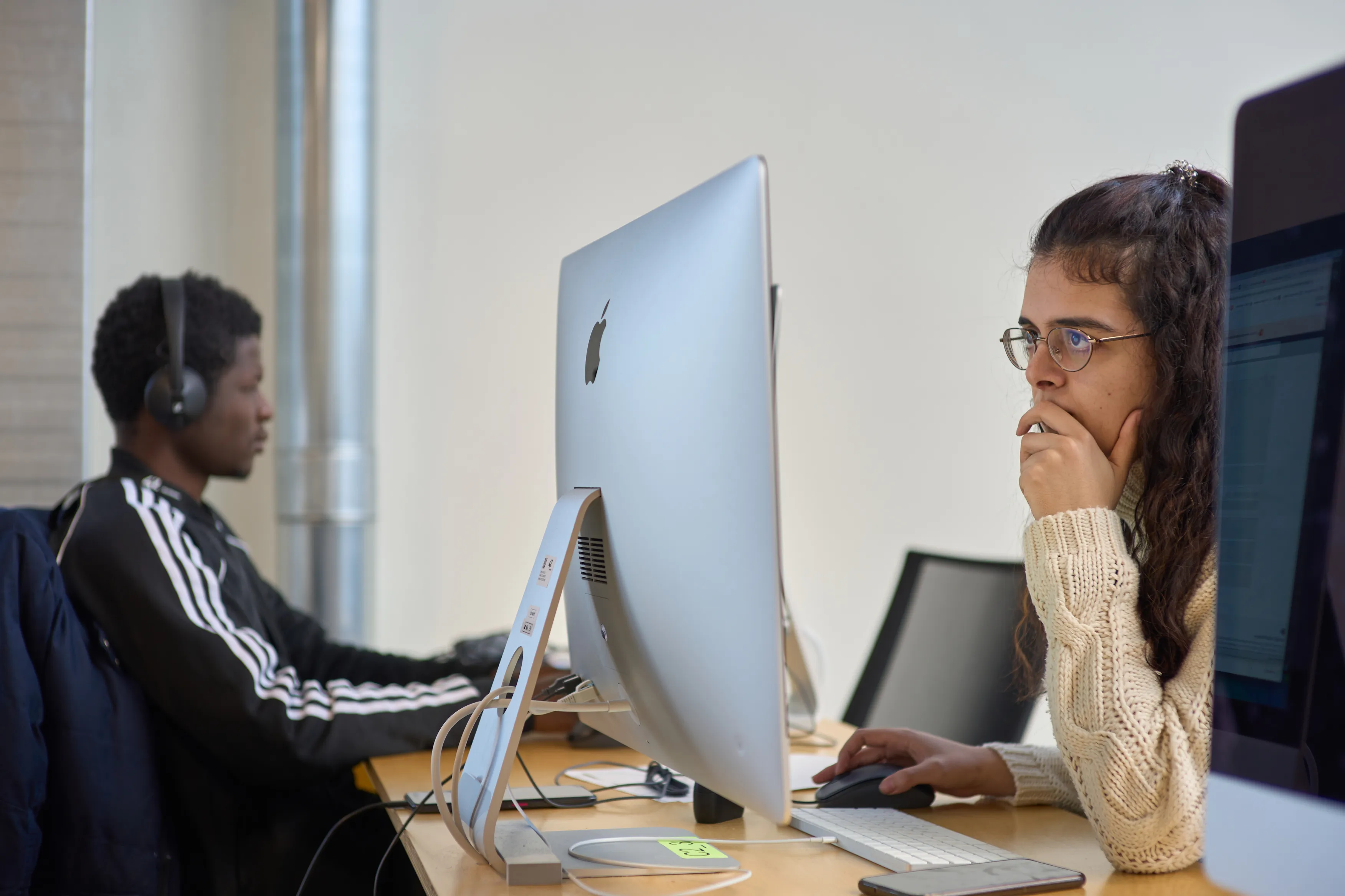 Two students coding side by side during the Piscine