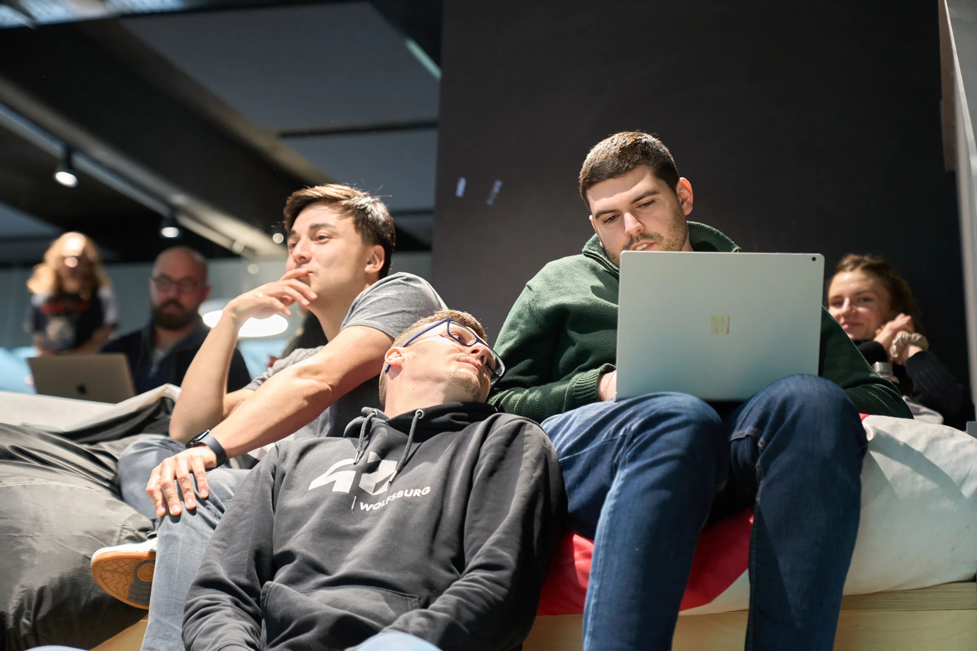 Students relaxing on beanbags
