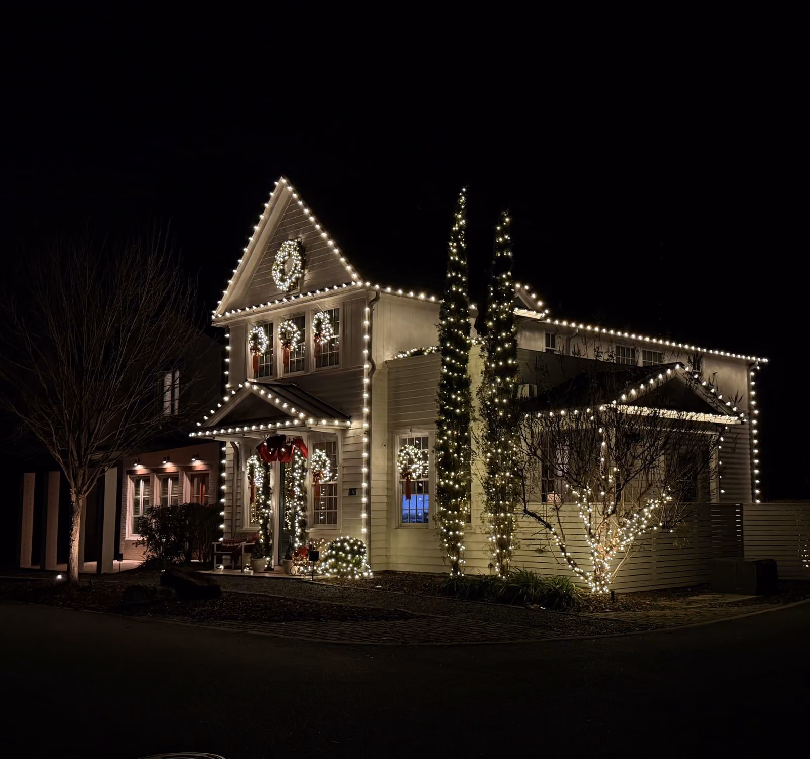 Christmas light installation on a beautifully decorated Georgia home