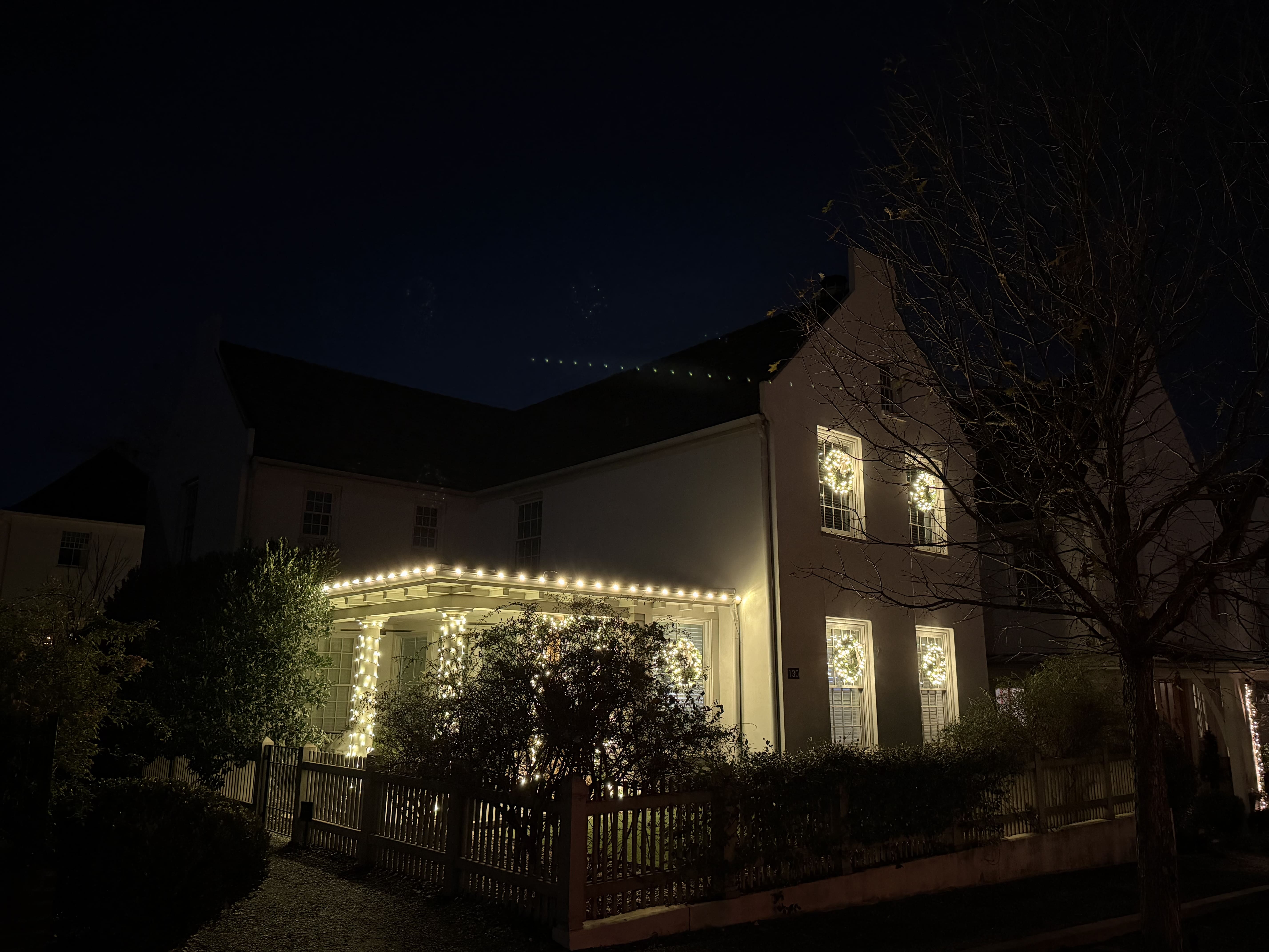 House decorated with holiday lights.