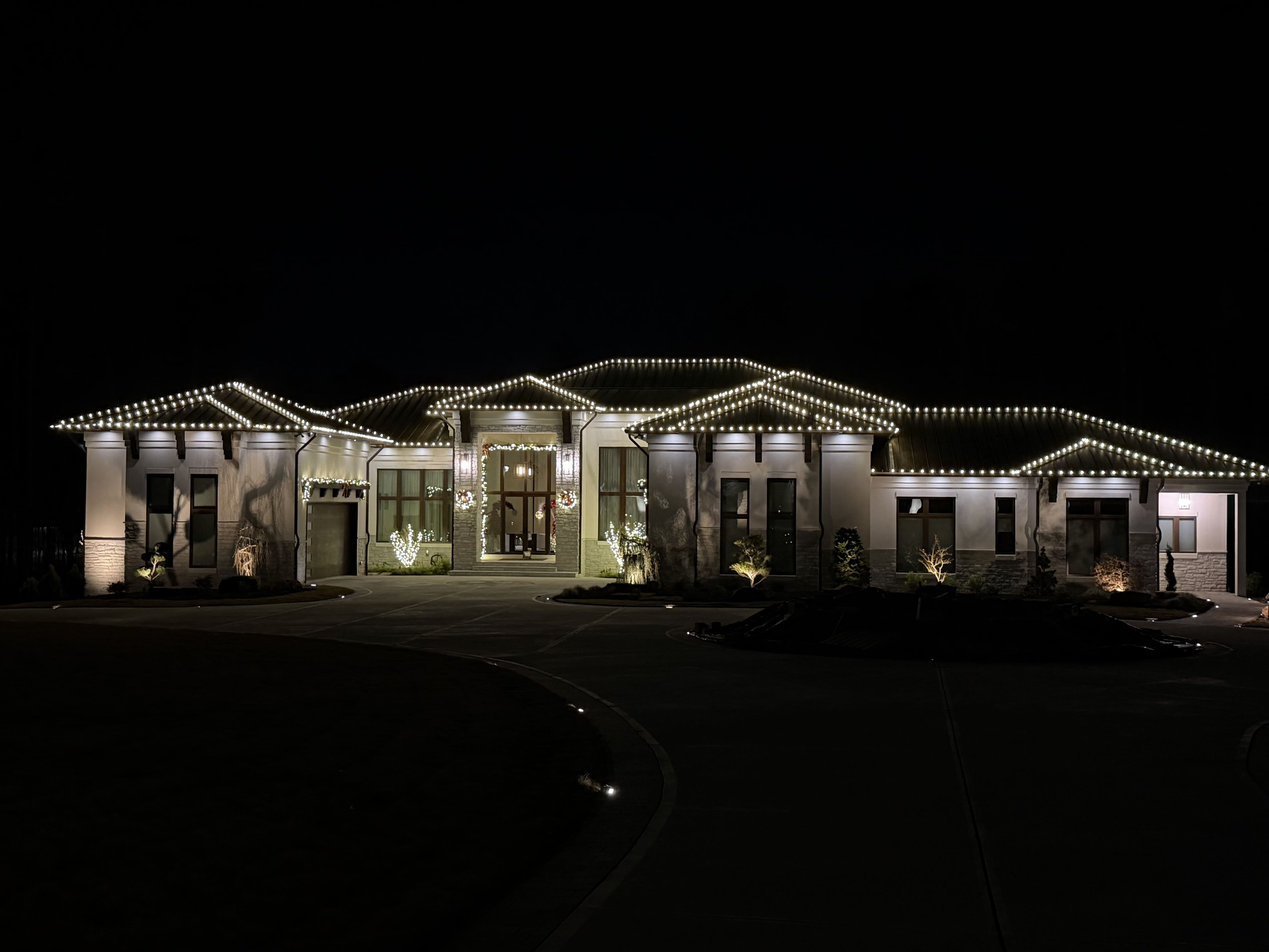 House decorated with holiday lights.