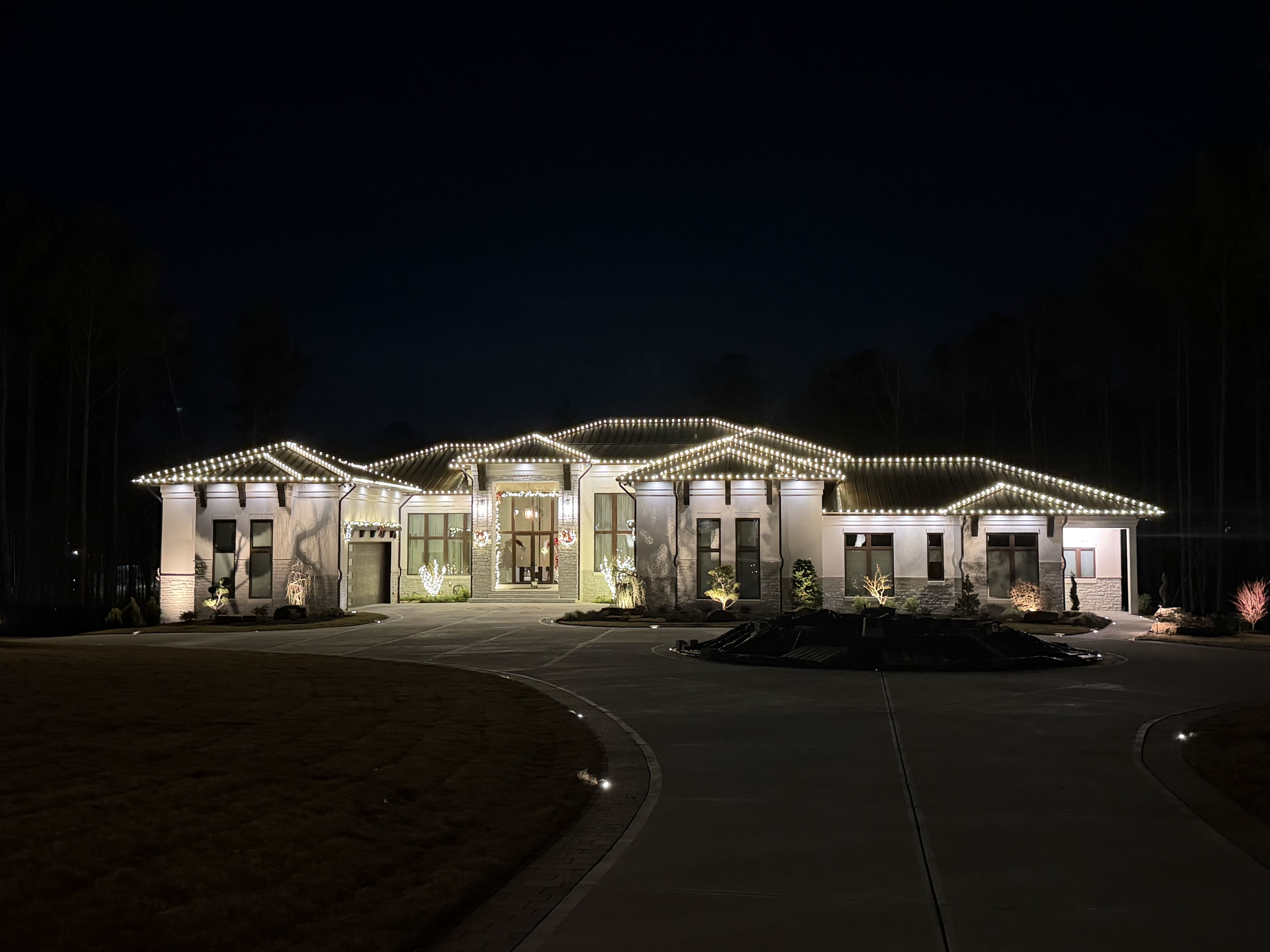 House decorated with holiday lights.