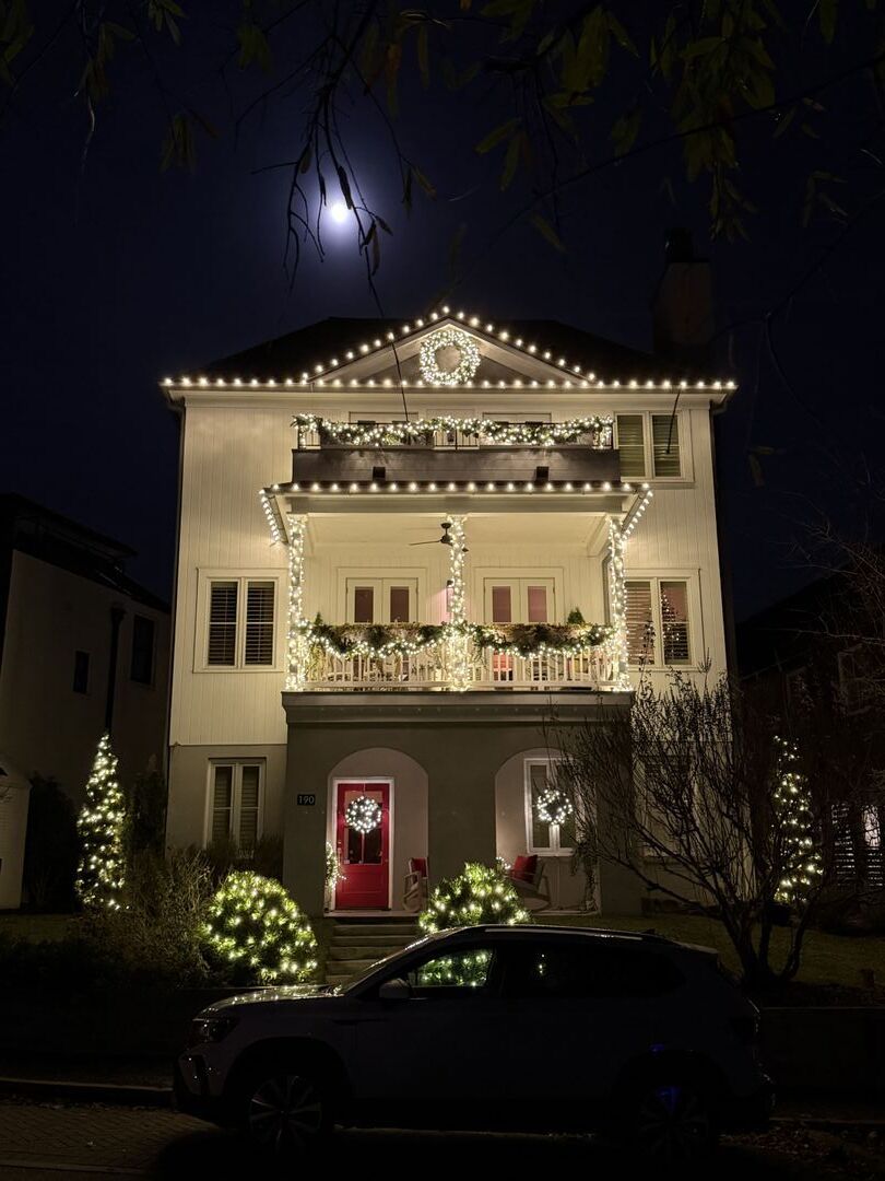 House decorated with holiday lights.