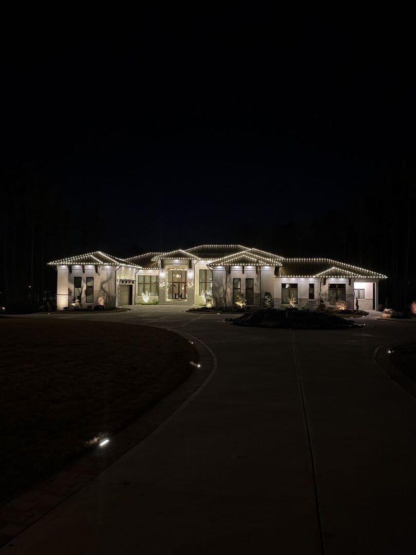 House decorated with holiday lights.