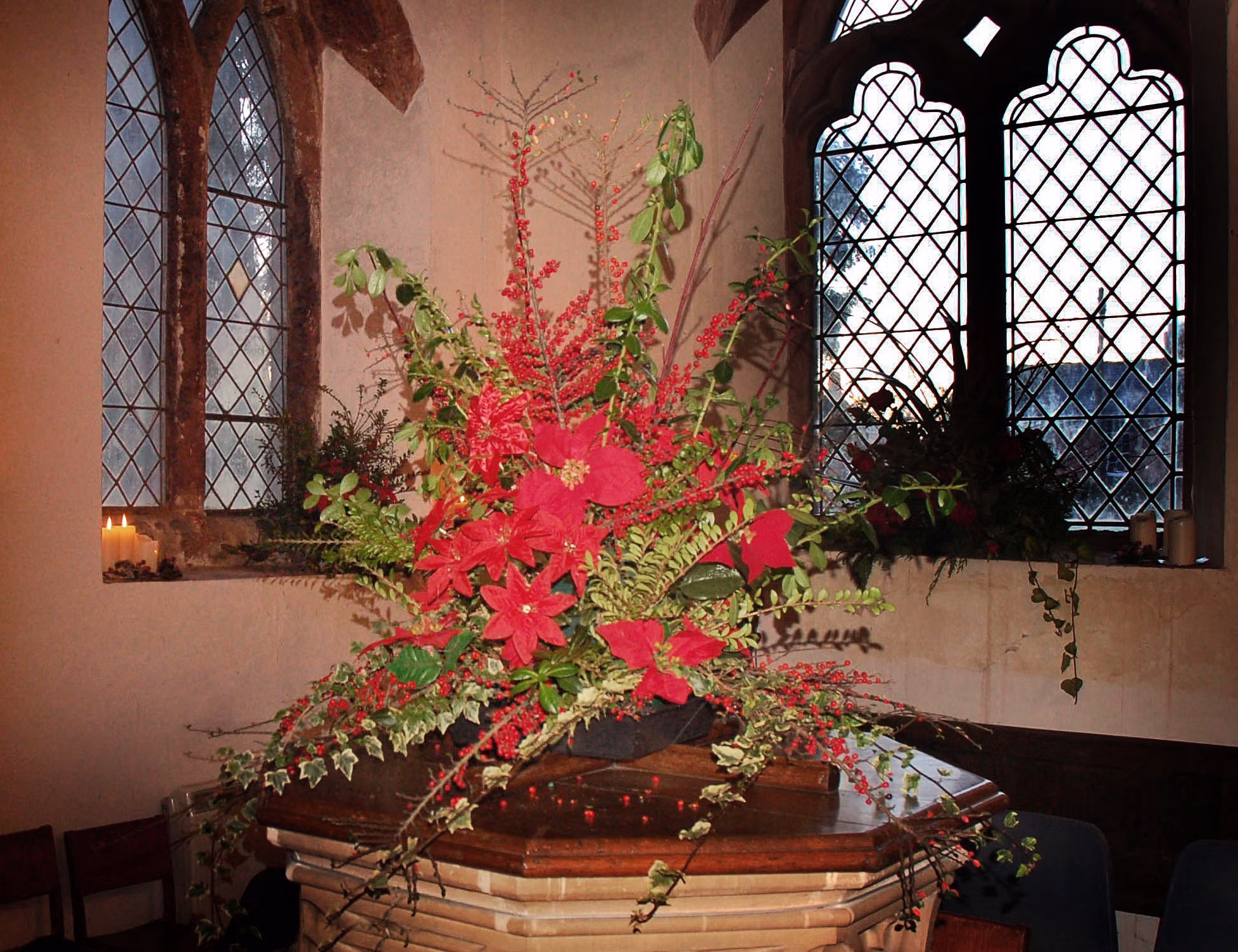 Victorian font decorated with flowers inside St Peter’s Church