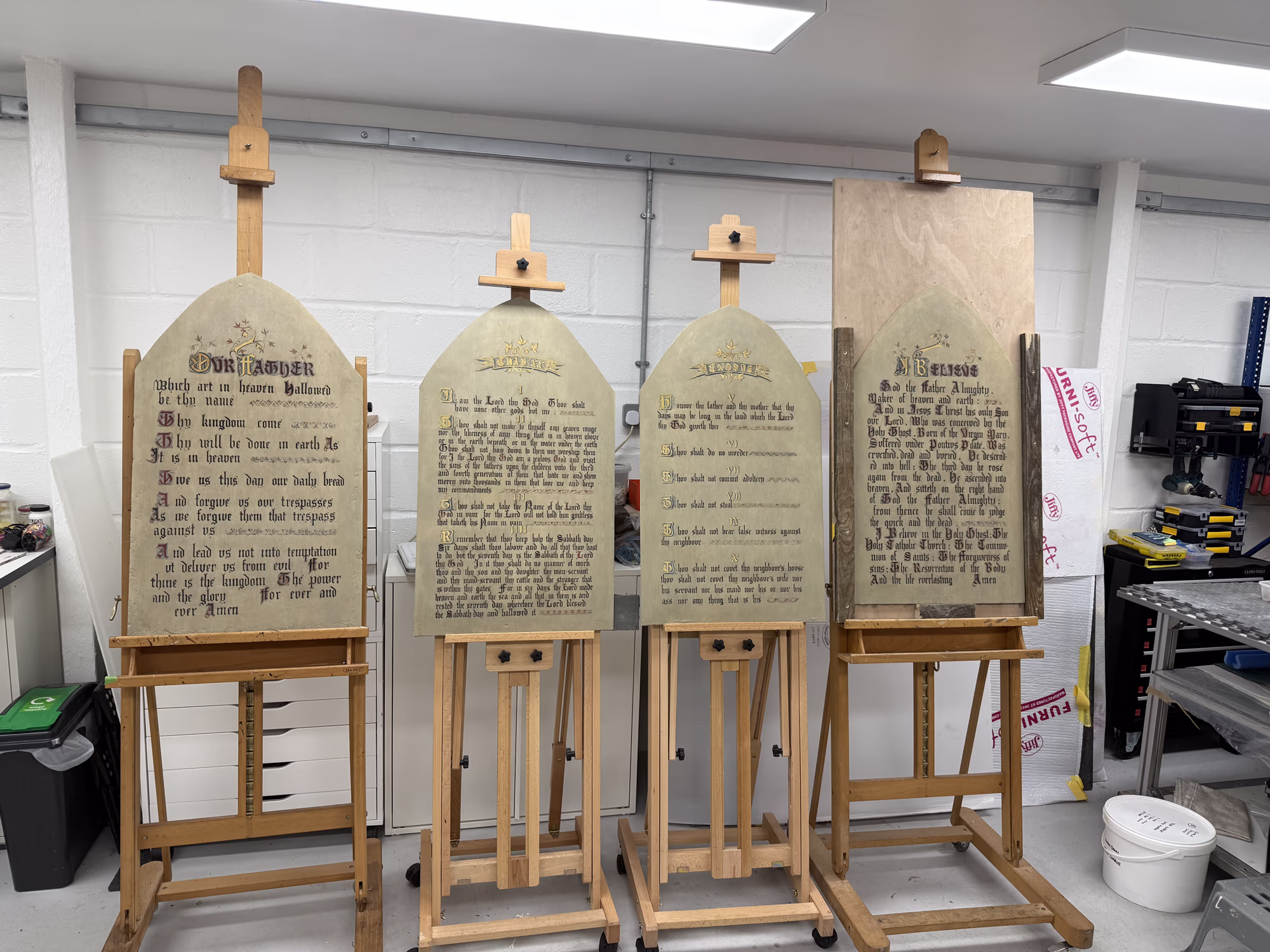Painted reredos tablets removed for specialist conservation