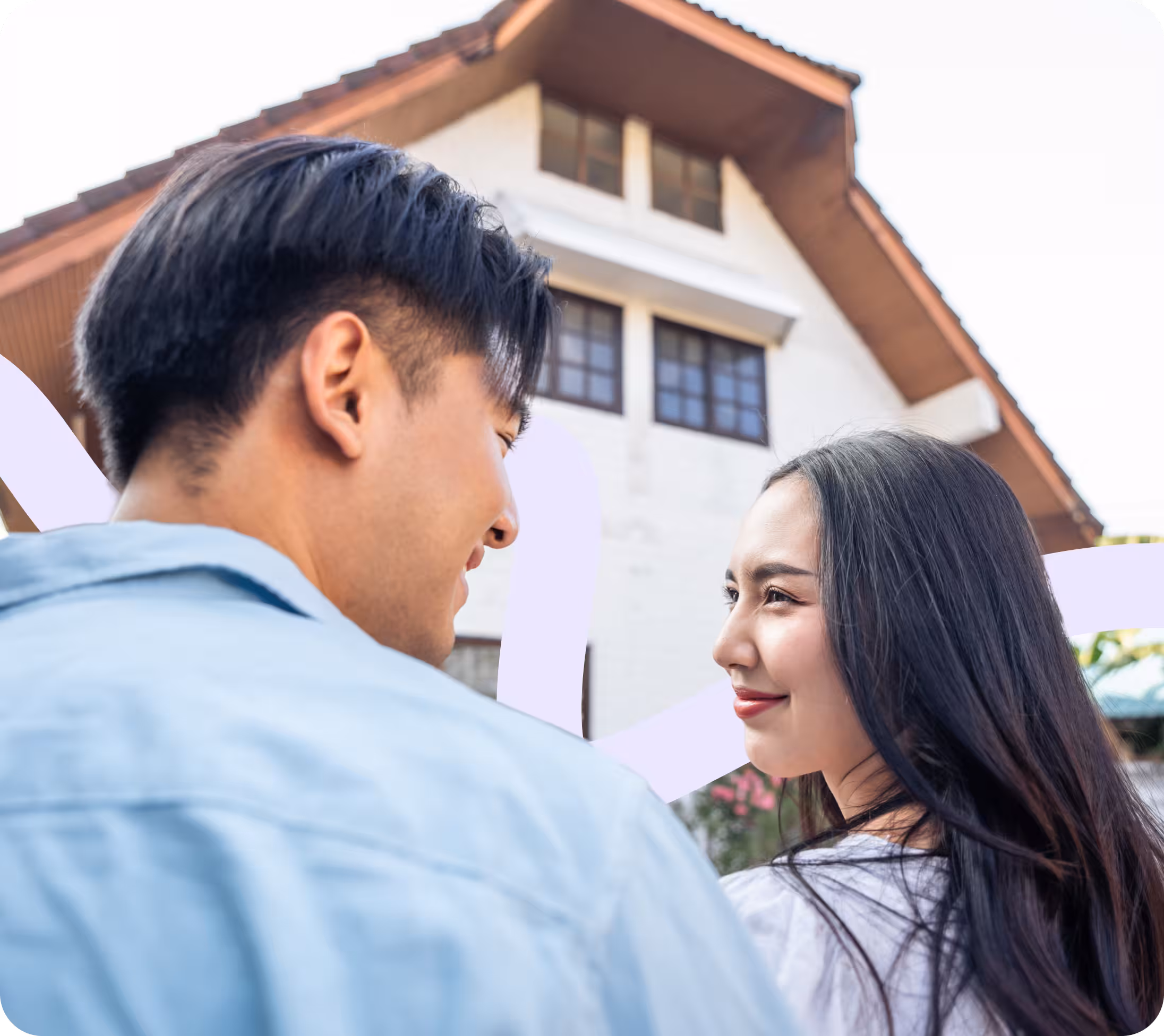 Couple celebrating the purchase of their new home