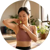 A student stretching in everyday clothes