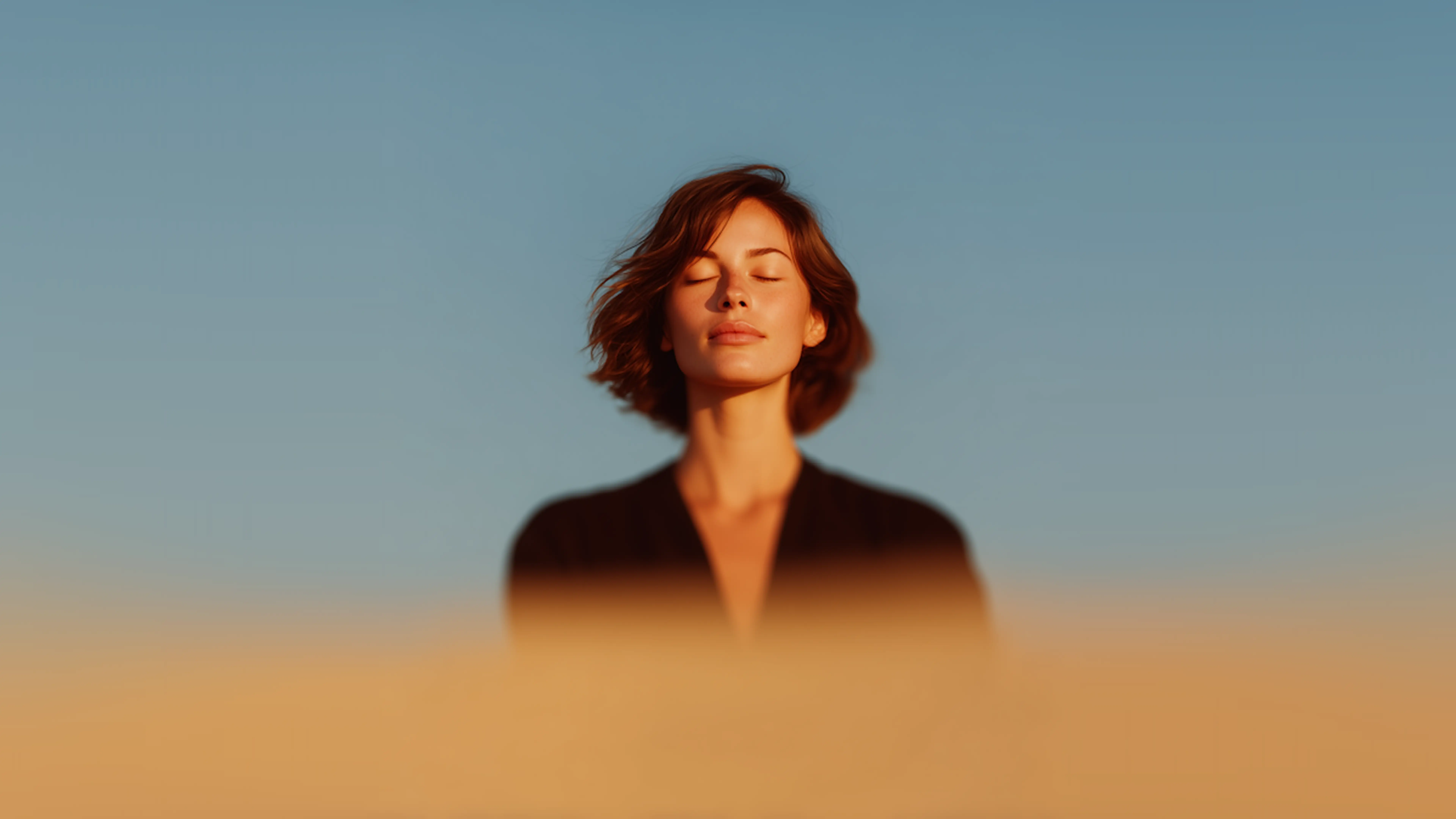 Woman with short brown hair resting with her eyes closed in soft studio light
