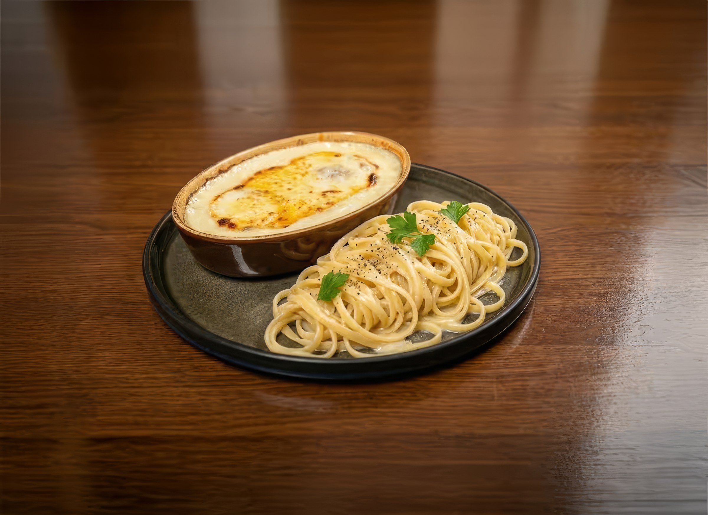 Escalope de volaille gratinée au Comté et linguine