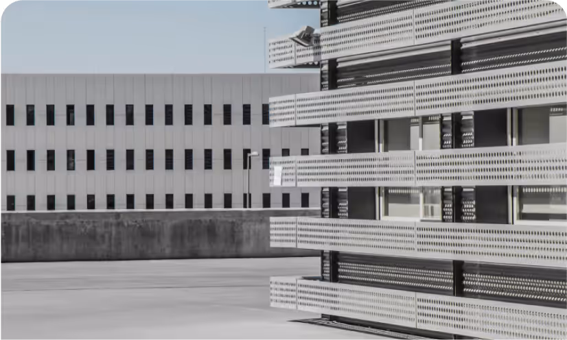 Perforated metal facade of a modern industrial building