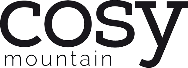 Logo avec le texte 'cosy mountain' en lettres noires élégantes.