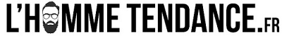Logo du site L'Homme Tendance avec un dessin stylisé d'un visage d'homme barbu portant des lunettes au centre de la lettre O.