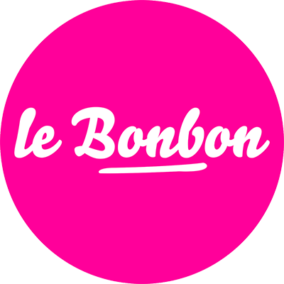 Logo rond rose vif avec le texte blanc "le Bonbon" en style manuscrit souligné.