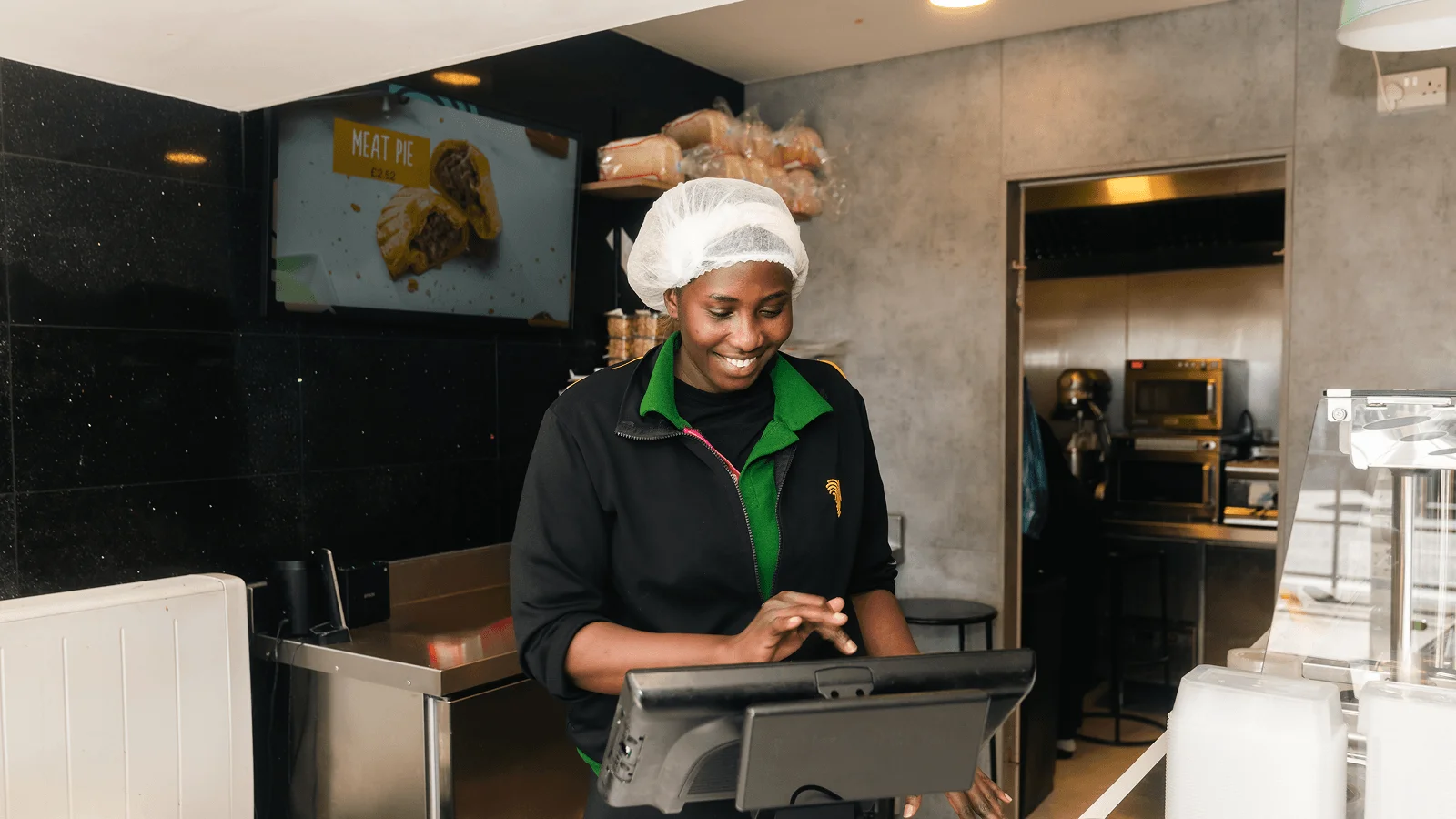 Restaurant employee using restaurant tech