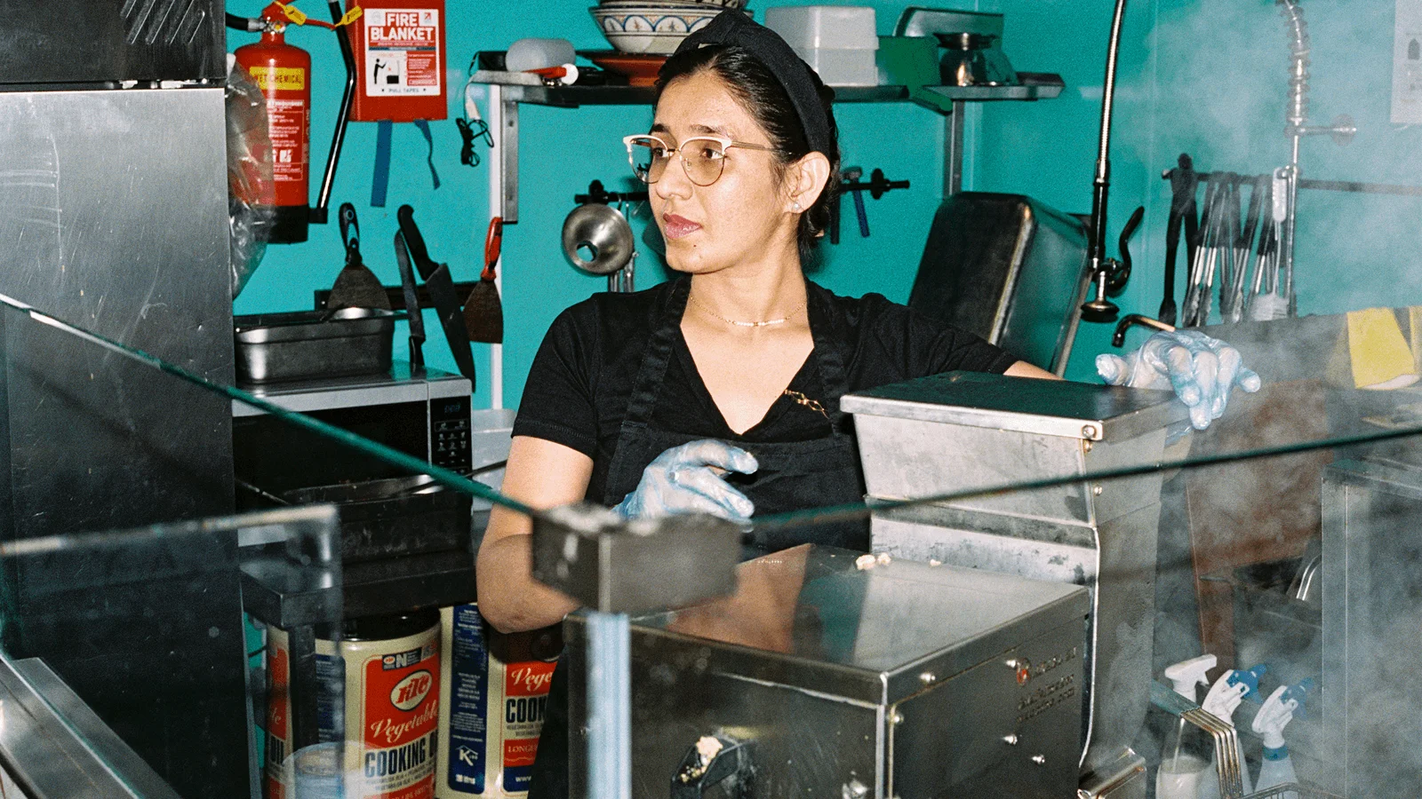 Restaurant employee preparing food in the kitchen