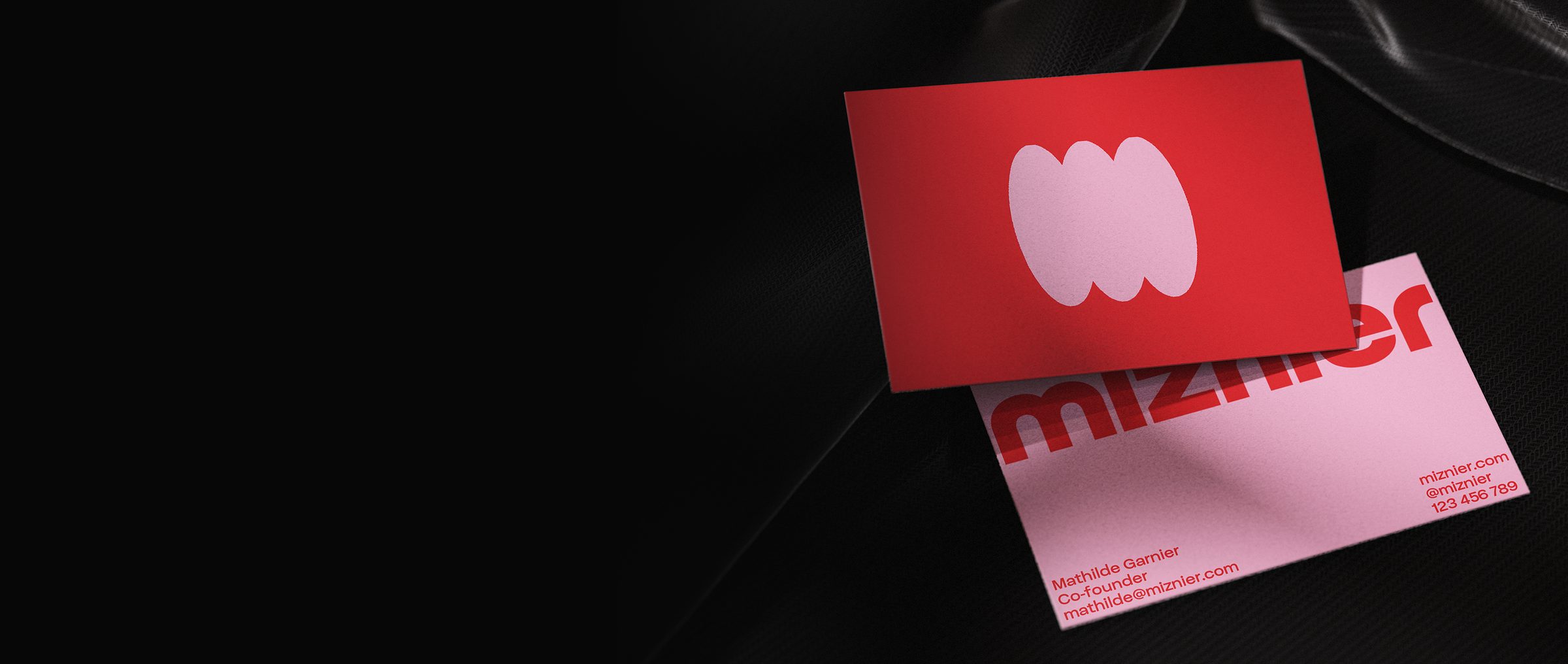 Printed brand stationery from a Miznier identity system
