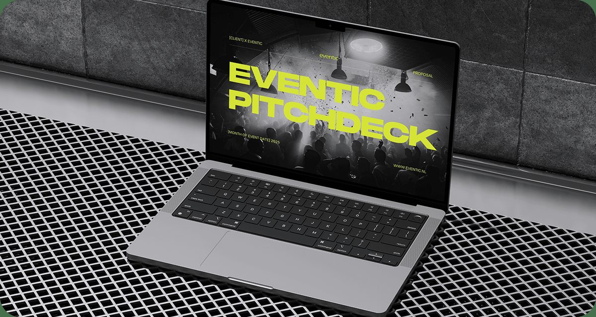 A laptop on a studio table showing the Eventic pitch deck