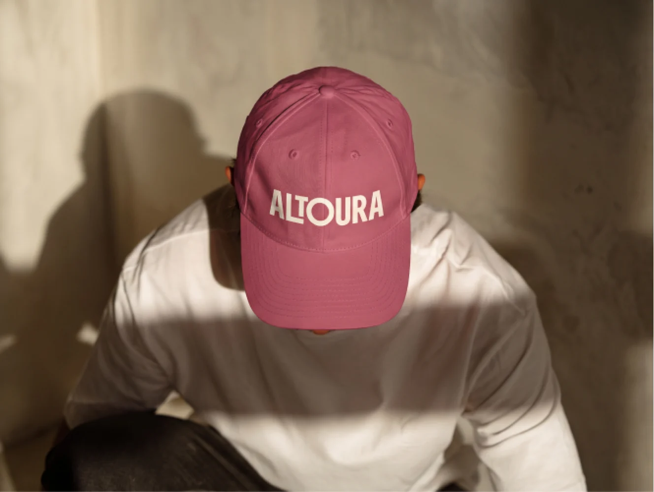 The Altoura logo applied to a cap