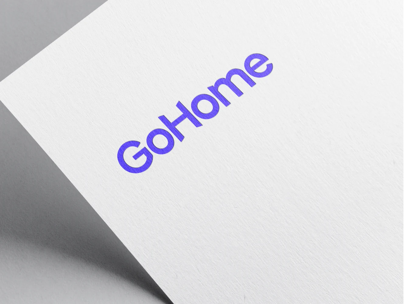 The GoHome logo applied to folded paper stock
