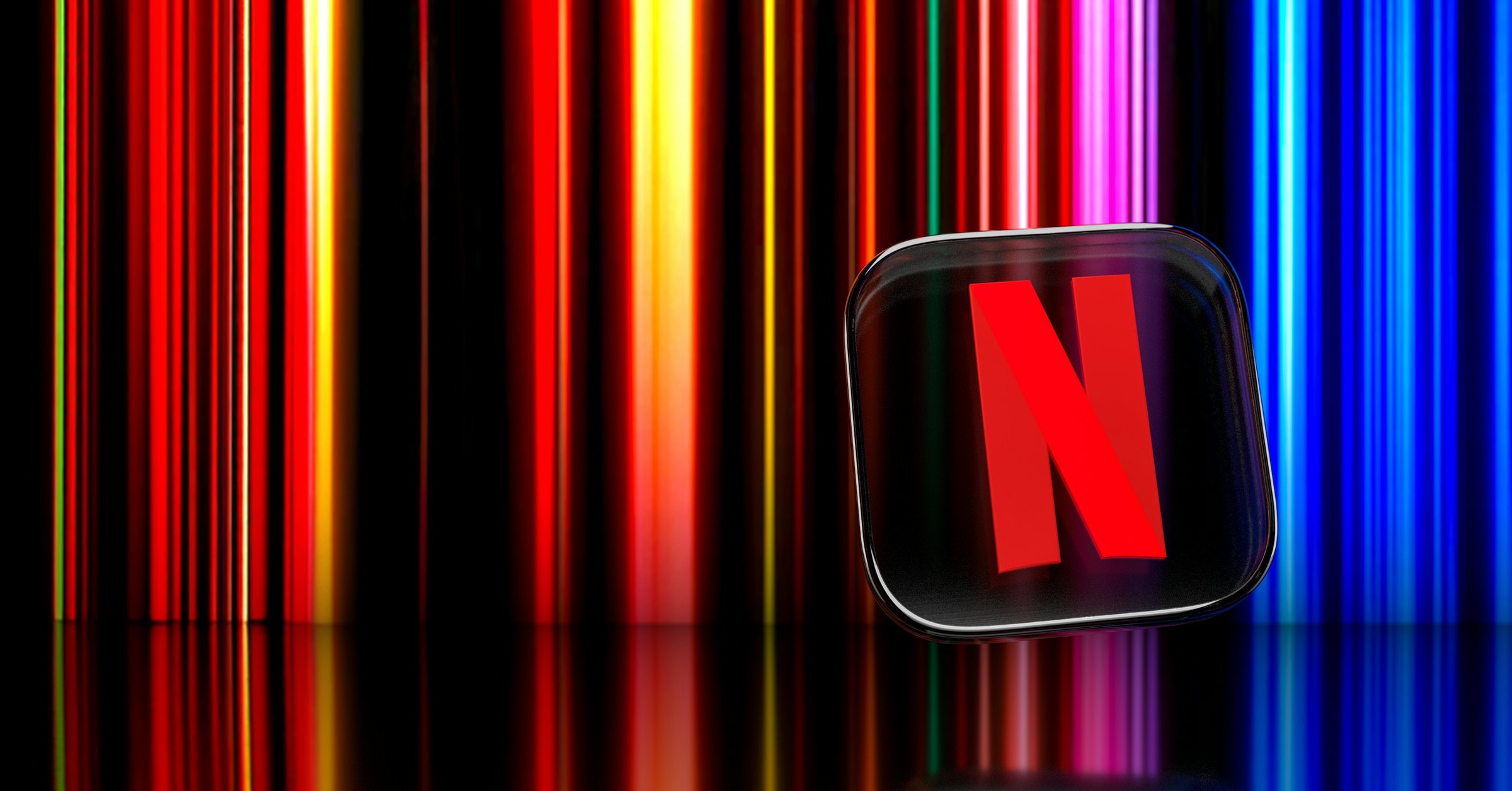 Netflix app icon floating in front of coloured light streaks
