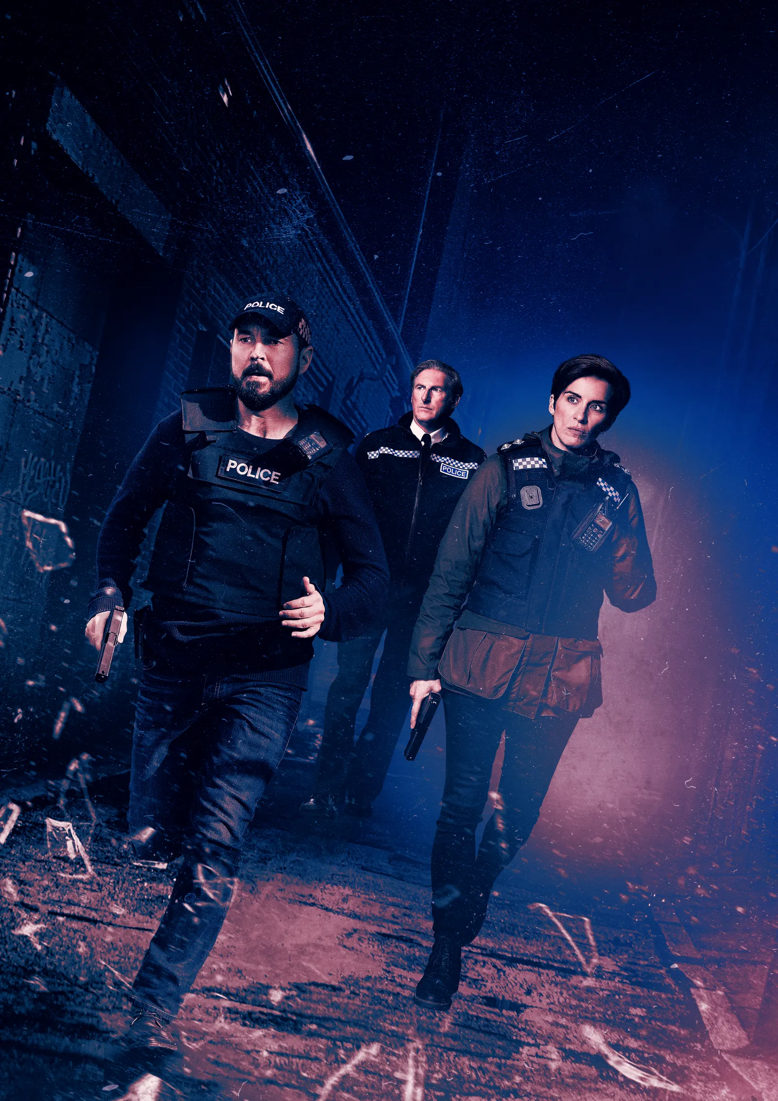 Group of five people in dark cloaks, one smiling in front holding a glowing smartphone.