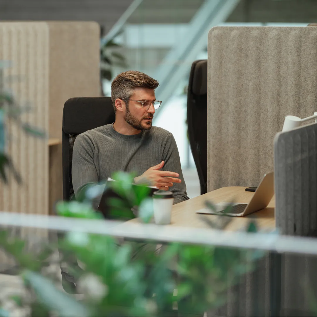 Jameco Construction CFO accountant working at a laptop in a our maidstone office