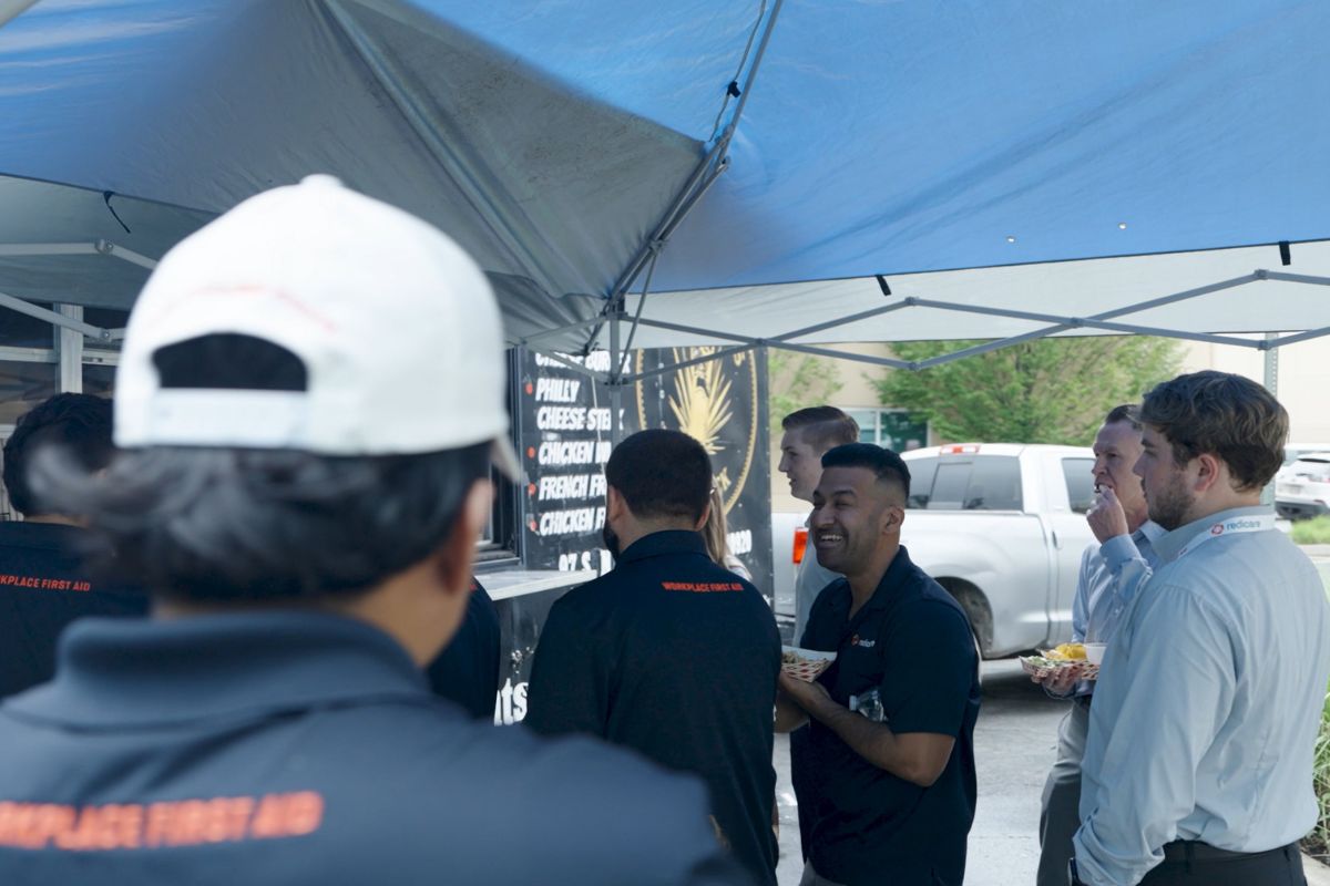 Redicare team members at a company event