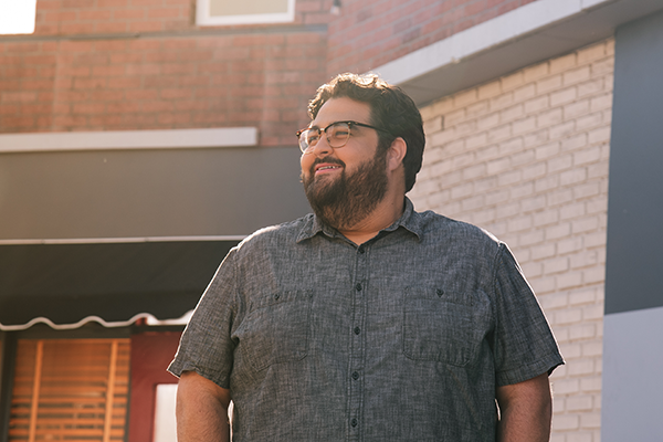 A man stands outdoors looking ahead in a calm setting. The image illustrates medical weight management, metabolic health and how metformin may be part of treatment for some people living with insulin resistance or type 2 diabetes.